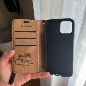 Coach iPhone wallet case.